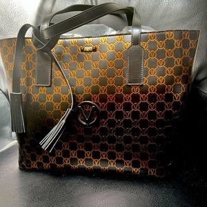 Gorgeous New Valentino leather bag. Black with bronze accents.